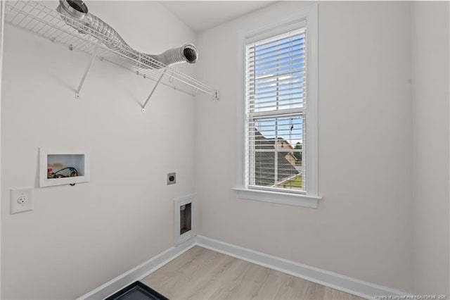 297 Colonist Pl, Cameron, NC 28326 - laundry area with electric dryer hookup, hookup for a washing machine, and light wood-style flooring