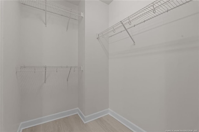 297 Colonist Pl, Cameron, NC 28326 - spacious closet with light wood finished floors