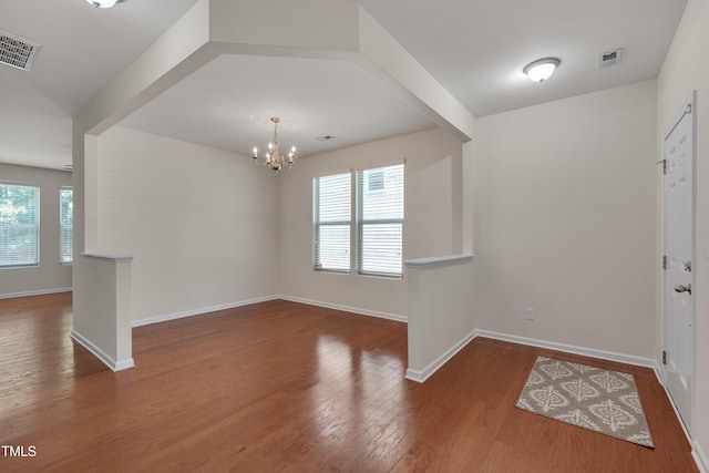130 Holly Berry Ln, Durham, NC 27703 - foyer featuring wood finished floors and a chandelier