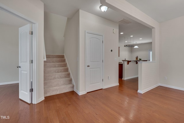 130 Holly Berry Ln, Durham, NC 27703 - staircase featuring wood finished floors