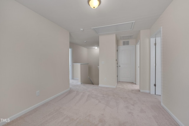 130 Holly Berry Ln, Durham, NC 27703 - carpeted spare room with attic access and baseboards
