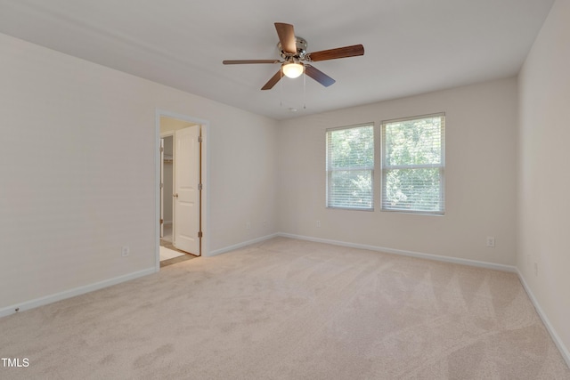 130 Holly Berry Ln, Durham, NC 27703 - empty room with light carpet and a ceiling fan