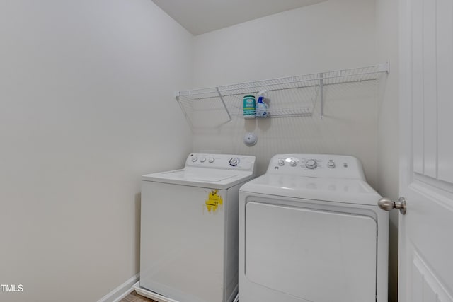 130 Holly Berry Ln, Durham, NC 27703 - washroom with independent washer and dryer and baseboards