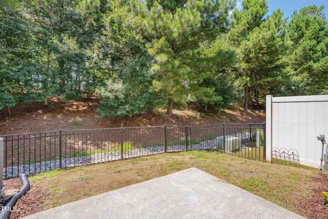 130 Holly Berry Ln, Durham, NC 27703 - view of yard with a patio area