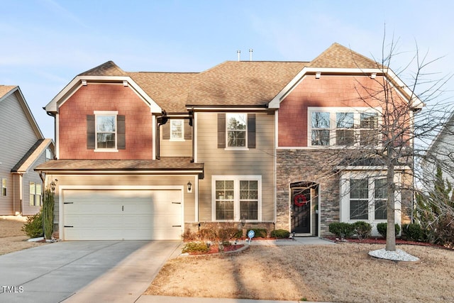27 Needham Ln, Clayton, NC 27527 - traditional-style home with concrete driveway, stone siding, an attached garage, and a shingled roof