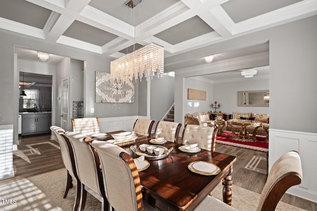 27 Needham Ln, Clayton, NC 27527 - dining area with wood finished floors, stairway, beamed ceiling, coffered ceiling, and a chandelier