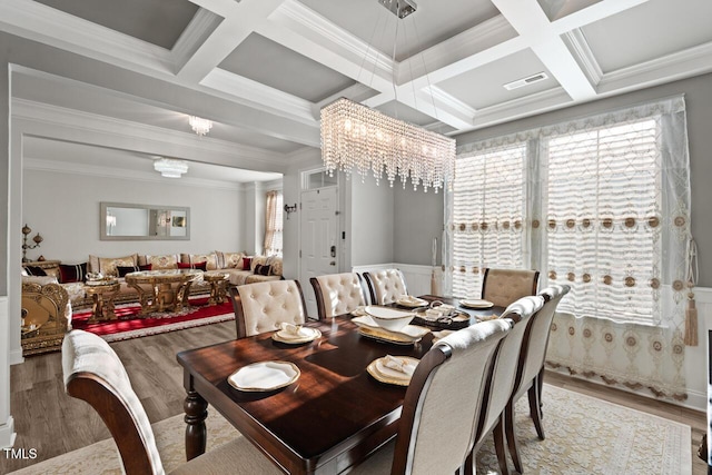 27 Needham Ln, Clayton, NC 27527 - dining area with plenty of natural light, wood finished floors, coffered ceiling, beamed ceiling, and ornamental molding