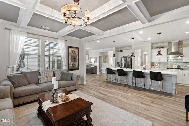 27 Needham Ln, Clayton, NC 27527 - living room with coffered ceiling, light wood finished floors, crown molding, a chandelier, and recessed lighting