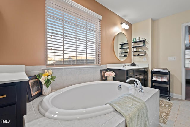 27 Needham Ln, Clayton, NC 27527 - full bath with a garden tub, vanity, and tile patterned floors