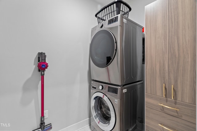 105 Chatham Walk Ln Unit 208, Cary, NC 27511 - washroom with stacked washer / drying machine and baseboards