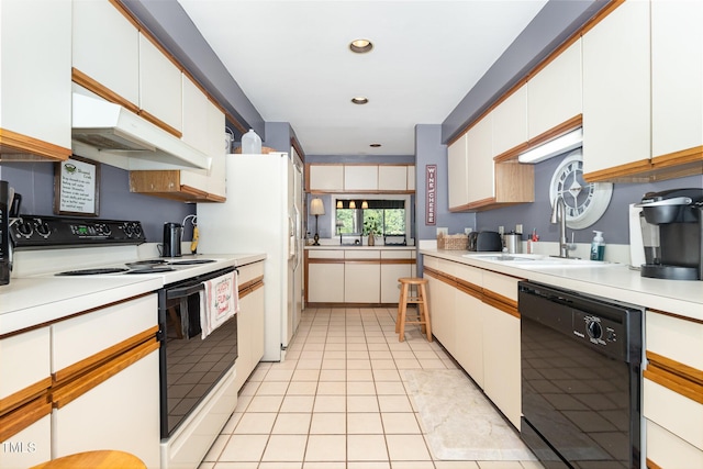 7 Weybridge Pl, Chapel Hill, NC 27517 - kitchen featuring electric range oven, black dishwasher, light countertops, white cabinets, and recessed lighting