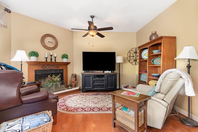 7 Weybridge Pl, Chapel Hill, NC 27517 - living area featuring ceiling fan, wood finished floors, and a premium fireplace