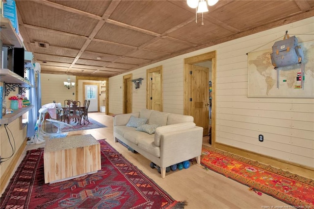 1203 Simpson St, Fayetteville, NC 28305 - living area with wood finished floors and wood walls