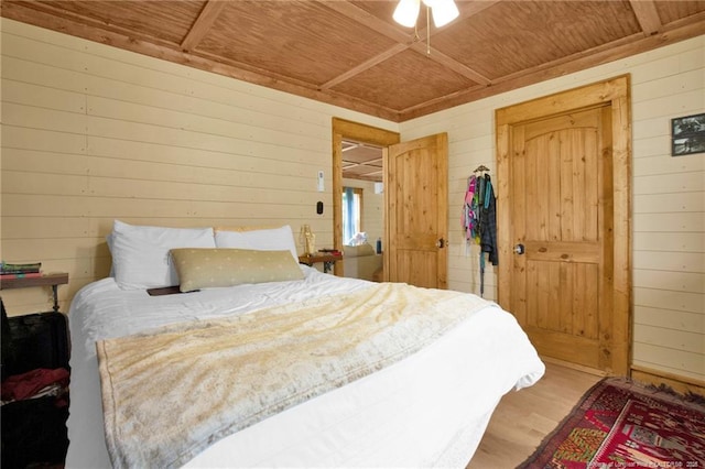 1203 Simpson St, Fayetteville, NC 28305 - bedroom with wood walls, wooden ceiling, and wood finished floors