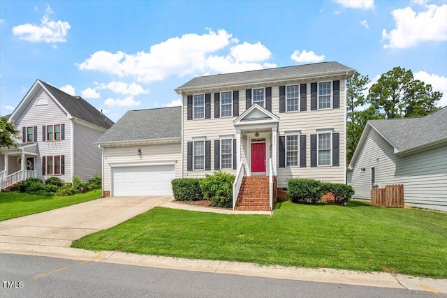 2301 Laurel Valley Way, Raleigh, NC 27604 - colonial-style house featuring an attached garage, concrete driveway, and a front yard