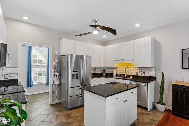2301 Laurel Valley Way, Raleigh, NC 27604 - kitchen with stainless steel appliances, a ceiling fan, tasteful backsplash, white cabinets, and recessed lighting