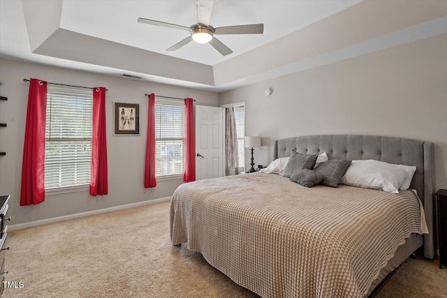 2301 Laurel Valley Way, Raleigh, NC 27604 - bedroom featuring carpet, a tray ceiling, and a ceiling fan