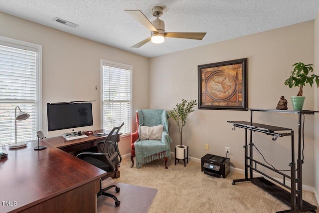 2301 Laurel Valley Way, Raleigh, NC 27604 - home office with a ceiling fan, carpet flooring, and a textured ceiling