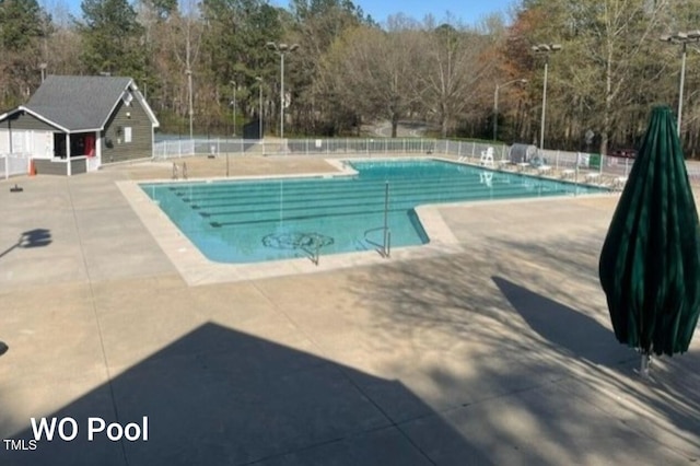 2301 Laurel Valley Way, Raleigh, NC 27604 - community pool featuring a patio and view of scattered trees