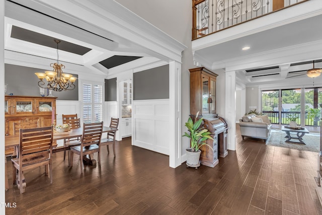 3329 Donlin Dr, Wake Forest, NC 27587 - dining room featuring coffered ceiling, crown molding, a decorative wall, a chandelier, and beamed ceiling