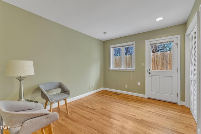 206 Spring Ln, Chapel Hill, NC 27514 - living area featuring light wood-style flooring and recessed lighting
