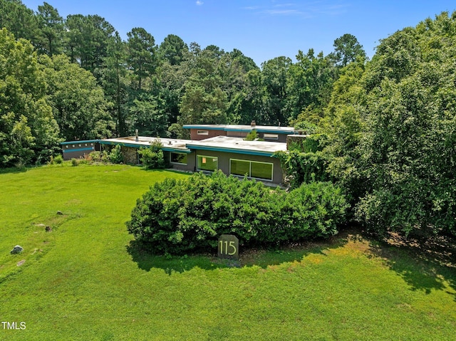 115 Ashworth Dr, Durham, NC 27707 - view of grassy yard with a forest view