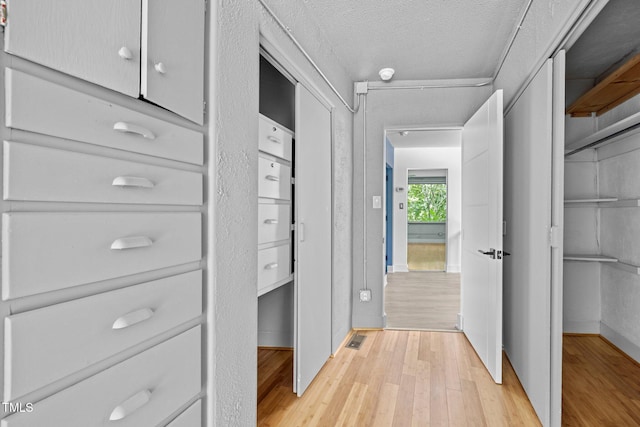 115 Ashworth Dr, Durham, NC 27707 - hall featuring light wood finished floors and baseboards