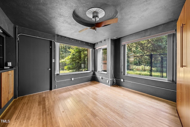 115 Ashworth Dr, Durham, NC 27707 - unfurnished room featuring a ceiling fan and wood finished floors
