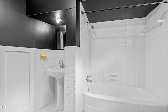 115 Ashworth Dr, Durham, NC 27707 - full bath with bathing tub / shower combination, tile walls, and a wainscoted wall