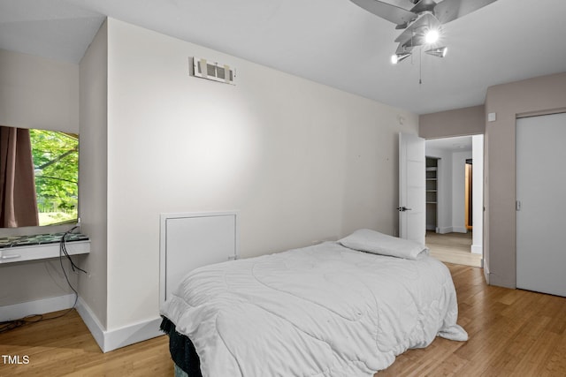 115 Ashworth Dr, Durham, NC 27707 - bedroom featuring light wood-type flooring and ceiling fan