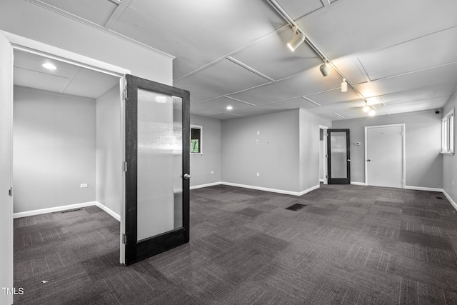 115 Ashworth Dr, Durham, NC 27707 - below grade area featuring dark carpet and track lighting