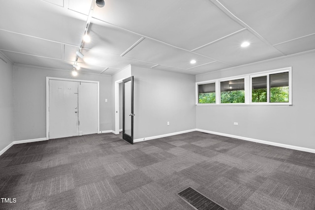 115 Ashworth Dr, Durham, NC 27707 - empty room with dark colored carpet, rail lighting, and recessed lighting