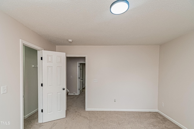2738 Garden Knoll Ln, Raleigh, NC 27614 - unfurnished room with light carpet and a textured ceiling