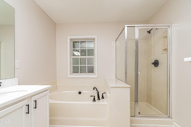 2738 Garden Knoll Ln, Raleigh, NC 27614 - bathroom with vanity, a shower stall, and a bath