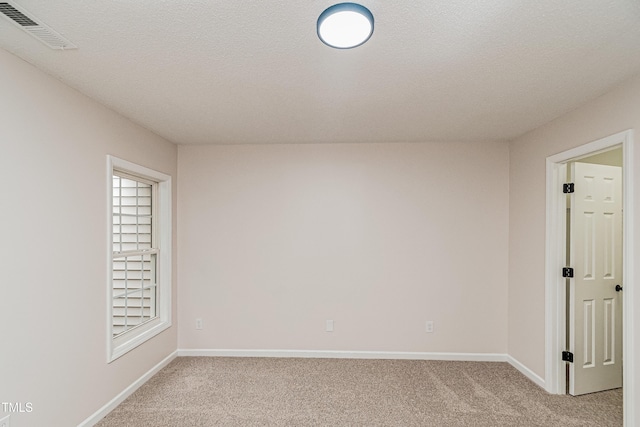 2738 Garden Knoll Ln, Raleigh, NC 27614 - unfurnished room featuring light carpet and a textured ceiling