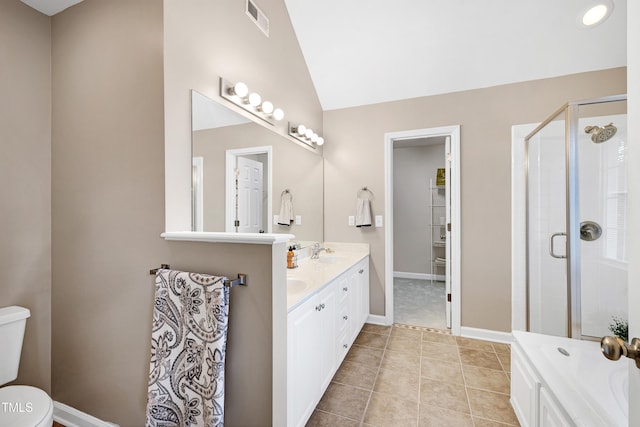 102 Whitlock Ln, Cary, NC 27513 - full bath with double vanity, a stall shower, lofted ceiling, a tub to relax in, and tile patterned floors