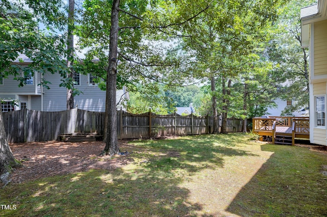 102 Whitlock Ln, Cary, NC 27513 - fenced backyard with a wooden deck