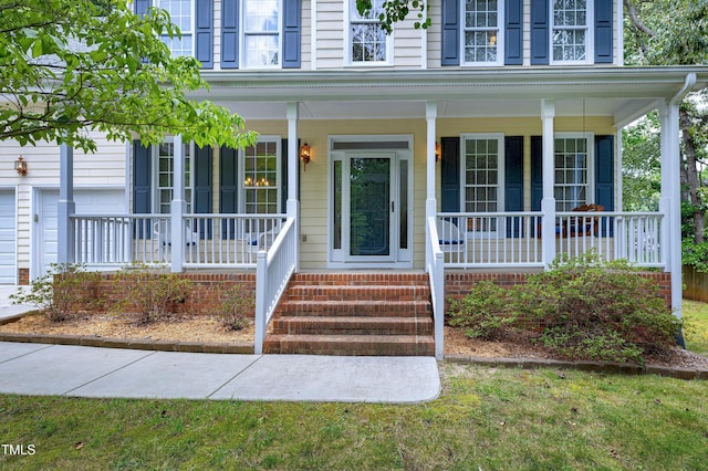 102 Whitlock Ln, Cary, NC 27513 - doorway to property with a porch