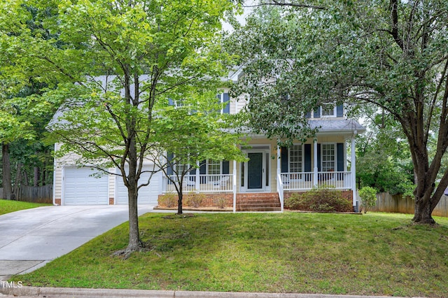 102 Whitlock Ln, Cary, NC 27513 - obstructed view of property featuring driveway, a garage, and covered porch