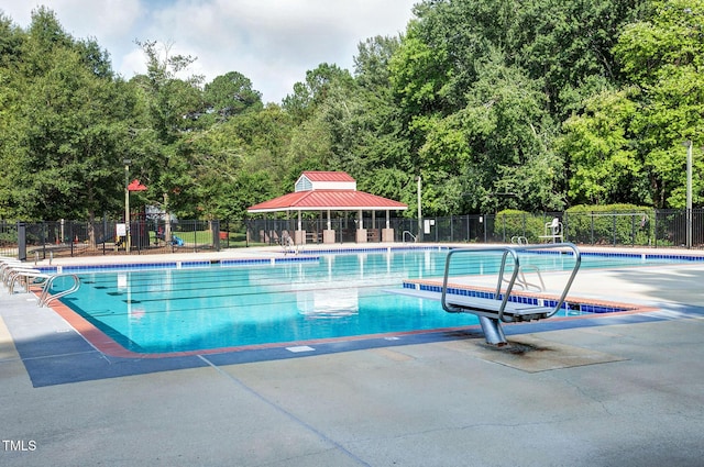 102 Whitlock Ln, Cary, NC 27513 - community pool with a patio