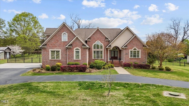 2011 Gibsonville Ossipee Rd, Elon, NC 27244 - view of front of home featuring brick siding