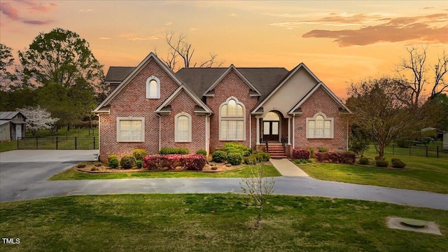 2011 Gibsonville Ossipee Rd, Elon, NC 27244 - view of front facade featuring brick siding and driveway