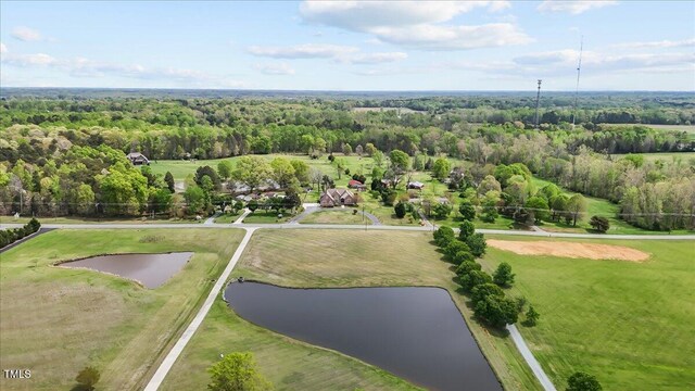 2011 Gibsonville Ossipee Rd, Elon, NC 27244 - drone / aerial view of a nearby body of water and a heavily wooded area