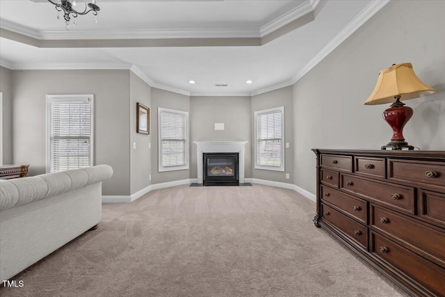 2011 Gibsonville Ossipee Rd, Elon, NC 27244 - living room with a tray ceiling, light carpet, a fireplace with flush hearth, recessed lighting, and crown molding