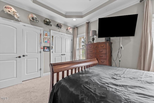 2011 Gibsonville Ossipee Rd, Elon, NC 27244 - carpeted bedroom featuring crown molding, a raised ceiling, and recessed lighting