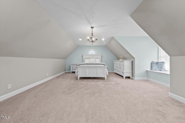 2011 Gibsonville Ossipee Rd, Elon, NC 27244 - bedroom with light colored carpet, vaulted ceiling, and a chandelier
