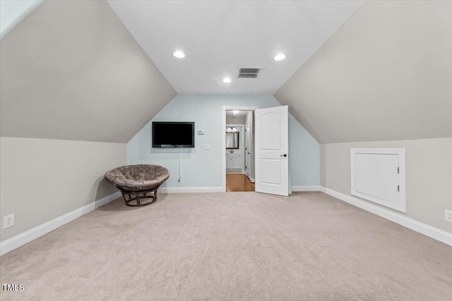 2011 Gibsonville Ossipee Rd, Elon, NC 27244 - additional living space with carpet floors, lofted ceiling, and recessed lighting