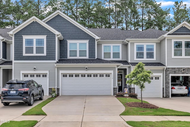 110 Gilder Woods Dr, Garner, NC 27529 - craftsman-style home featuring stone siding, driveway, an attached garage, and a shingled roof