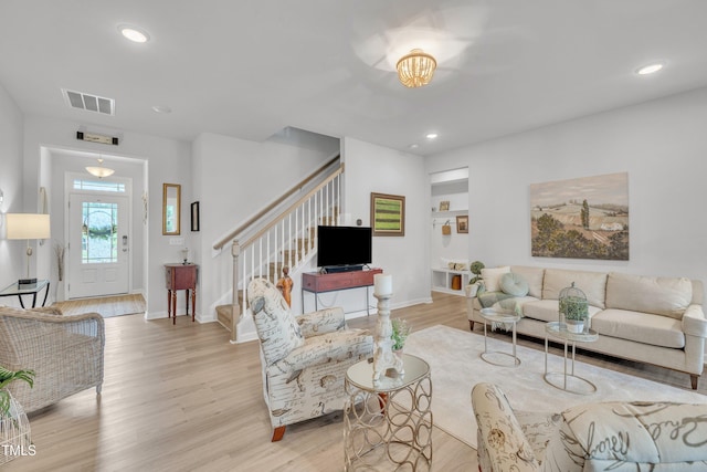 110 Gilder Woods Dr, Garner, NC 27529 - living area with stairway, light wood-type flooring, and recessed lighting