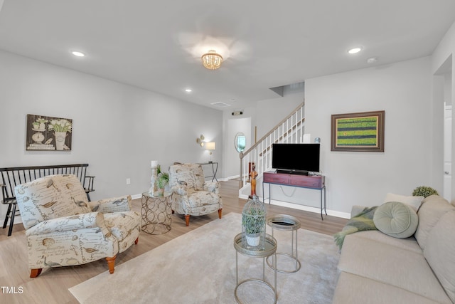 110 Gilder Woods Dr, Garner, NC 27529 - living room with stairway, wood finished floors, and recessed lighting